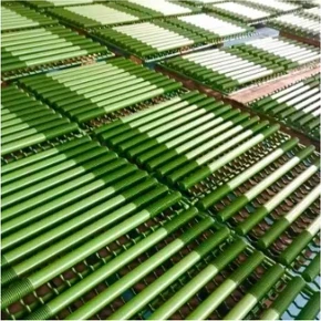 Green coated fasteners in production racks